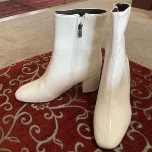 Very Beautiful light weight new white boots .